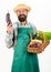 Fresh organic vegetables wicker basket. Man bearded presenting vegetables white background isolated. Hipster gardener