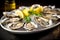 Fresh oyster dish placed on plate with ice and lemon