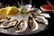 Fresh oyster dish placed on plate with ice and lemon