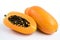 fresh Papayas on a pristine white background. The Papaya is perfectly ripe and bursting with flavor