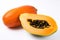 fresh Papayas on a pristine white background. The Papaya is perfectly ripe and bursting with flavor