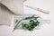 Fresh parsley, greenery with knife and kitchen towel on cutting board isolated on white. fresh healthy meal. Top view, flat lay