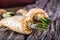 Fresh parsnips on old wooden table.