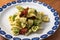 Fresh pasta orecchiette with broccoli and dried tomatoes