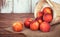 Fresh peach fruits in a basket