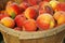 Fresh Peaches in wood basket