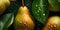 Fresh pears on a dark background, covered in water droplets. The pears are arranged naturally, creating a composition.