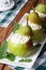 Fresh pears stuffed with cottage cheese vertical