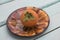 Fresh persimmon on a plate of frui