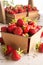 Fresh picked strawberries in wood crates
