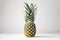 Fresh Pineapple on White Background for Tropical-Themed Invitations.