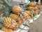 Fresh pineapples  sale in local vegetable market ,summer food on street market