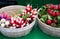 Fresh pink and white radishes at the farmers market