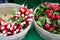 Fresh pink and white radishes at the farmers market