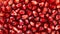 Fresh pomegranate seeds, close up, background