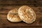 Fresh poppy seed bagel bread, on a vintage wooden table