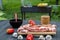 Fresh pork ribs in marinade lie on a chopping board before grilling