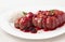 Fresh pork sausage and spicy sauce with berry rice on white background