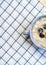 Fresh porridge with berries in a plate on a napkin