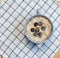 Fresh porridge with berries in a plate on a napkin