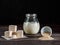 Fresh pressed yeast, dry instant yeast and active wheat sourdough starter on wooden table