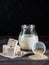 Fresh pressed yeast, dry instant yeast and active wheat sourdough starter on wooden table