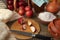 Fresh products for a healthy diet on the cook`s desk: squash, pumpkin, juicy apples, wheat flour, a jug of milk, olive oil. Retro