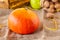 Fresh Pumpkin. Autumn fruits and vegetables. Autumn colors. Vibrant colors. Pumpkin, nuts and pear. Stocks for winter. Autumn is c