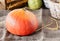 Fresh Pumpkin. Autumn fruits and vegetables. Autumn colors. Vibrant colors. Pumpkin, nuts and pear. Stocks for winter. Autumn is c