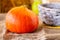 Fresh Pumpkin. Autumn fruits and vegetables. Autumn colors. Vibrant colors. Pumpkin, nuts and pear. Stocks for winter. Autumn is c