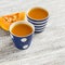 Fresh pumpkin juice in vintage ceramic cups