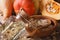 Fresh pumpkin seed oil in a bottle macro on the table. Horizonta