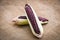 Fresh purple corn on cob on sack background / Siam Ruby Queen or sweet red corn