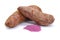 Fresh purple sweet potatoes, and It`s processed into powder. isolated on a white background