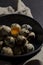 Fresh quail eggs. Rustic style on dark background