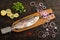 Fresh rainbow trout on a special wooden fish cutting board