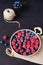 Fresh raspberries and blueberries dark picture. Fresh fruits, berries in an old copper cup, bowl. Dark Styled Stock Photo, Black