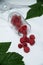 Fresh raspberries in a glass on the table. Healthy and vitamine food