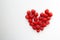 Fresh raspberries heart shaped composition