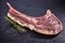 Fresh raw aged lean tomahawk beef steak