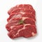 Fresh raw beef pieces arranged elegantly against pristine white background