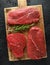 Fresh Raw braising beef steak on wooden board