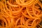 Fresh raw carrot spiralized spaghetti