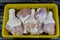Fresh raw chicken legs drumsticks hindquarter with skin and bones that is ready for baking, grilling, barbecuing, frying or