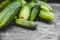 Fresh and raw cucumber on wooden table, cucumis sativus