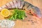 Fresh raw fish of red-finned mullet on wooden background