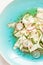 Fresh raw food diet salad close up. Zucchini \'tagliatelle\', radish slices