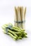 Fresh raw green and white asparagus bundle offered as close-up with ribbon