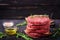 Fresh raw homemade minced beef steak burger with spices