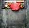 Fresh raw meat with cooking seasoning and butcher knife on rustic background